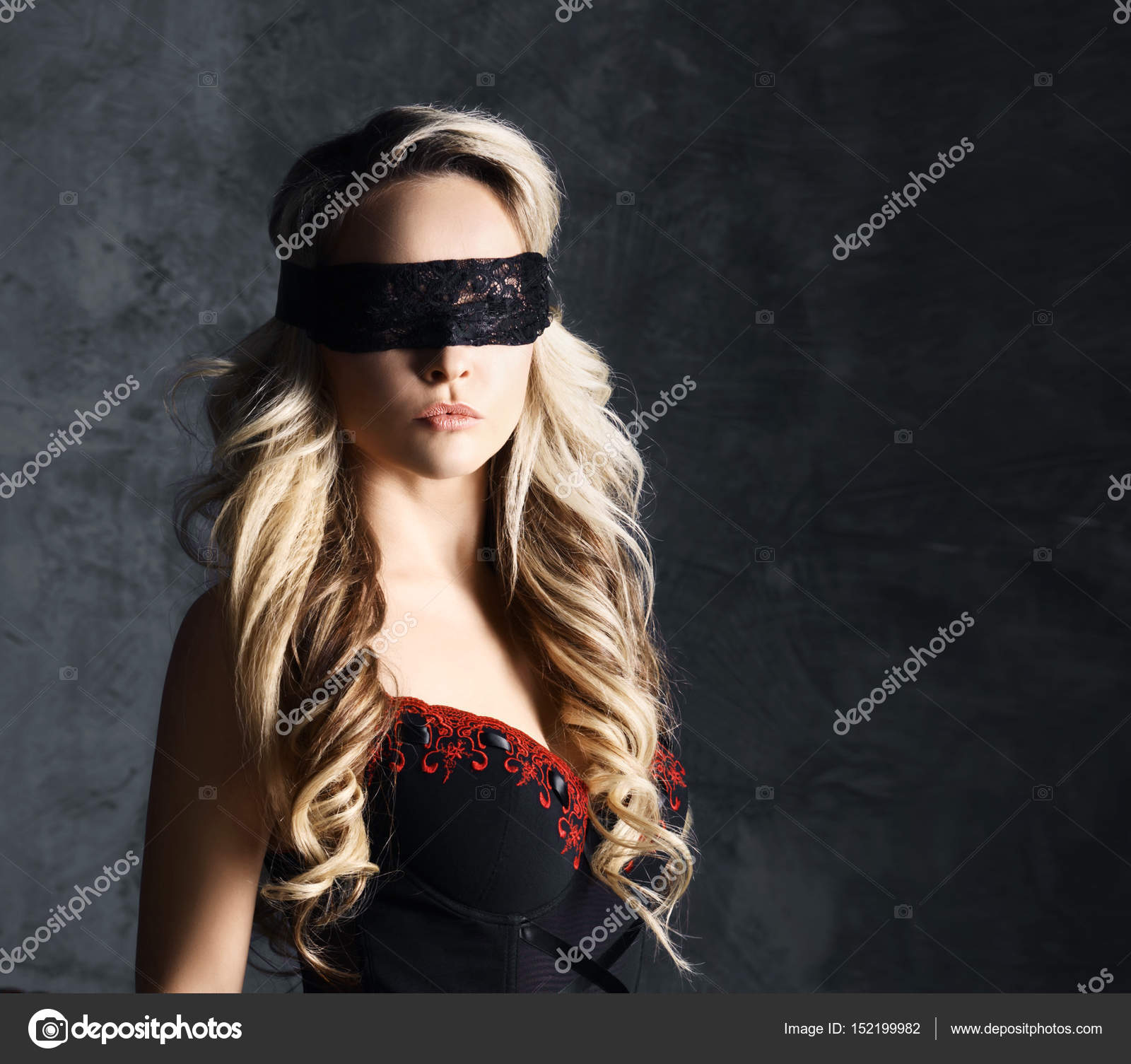 Beautiful woman portrait with blindfolded eyes. Submissive Stock Photo