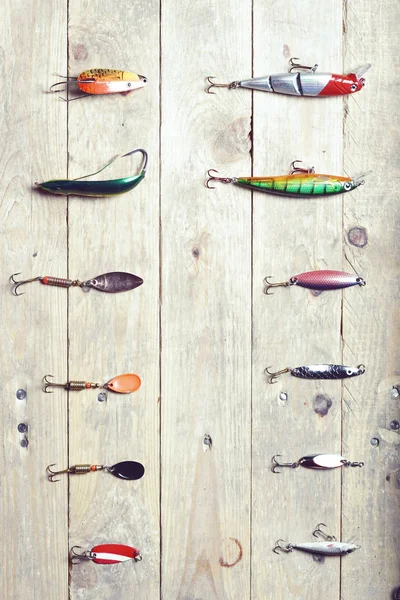 Fishing tackle on wooden planks — Stock Photo, Image