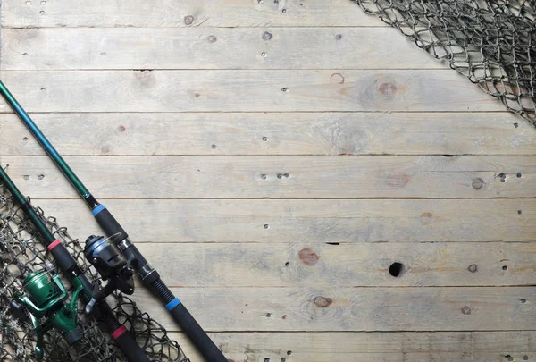 Fishing nets on wooden planks — Stock Photo, Image