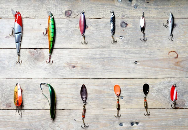 Fishing tackle on wooden planks — Stock Photo, Image