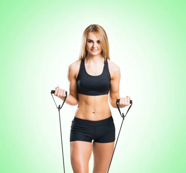 Mujer joven en forma en ropa deportiva deportiva — Foto de Stock