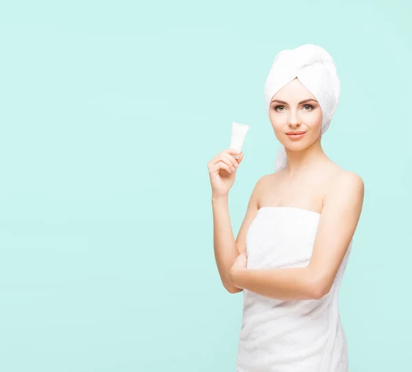 Young woman wrapped in towel — Stock Photo, Image