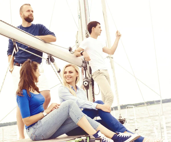 Happy friends traveling on yacht — Stock Photo, Image