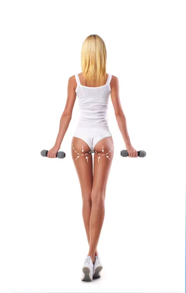 Slender woman exercising with dumbbells — Stock Photo, Image