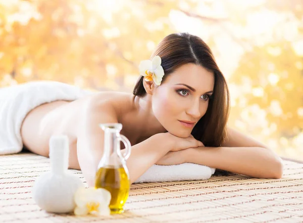 Young and natural woman on spa massage — Stock Photo, Image