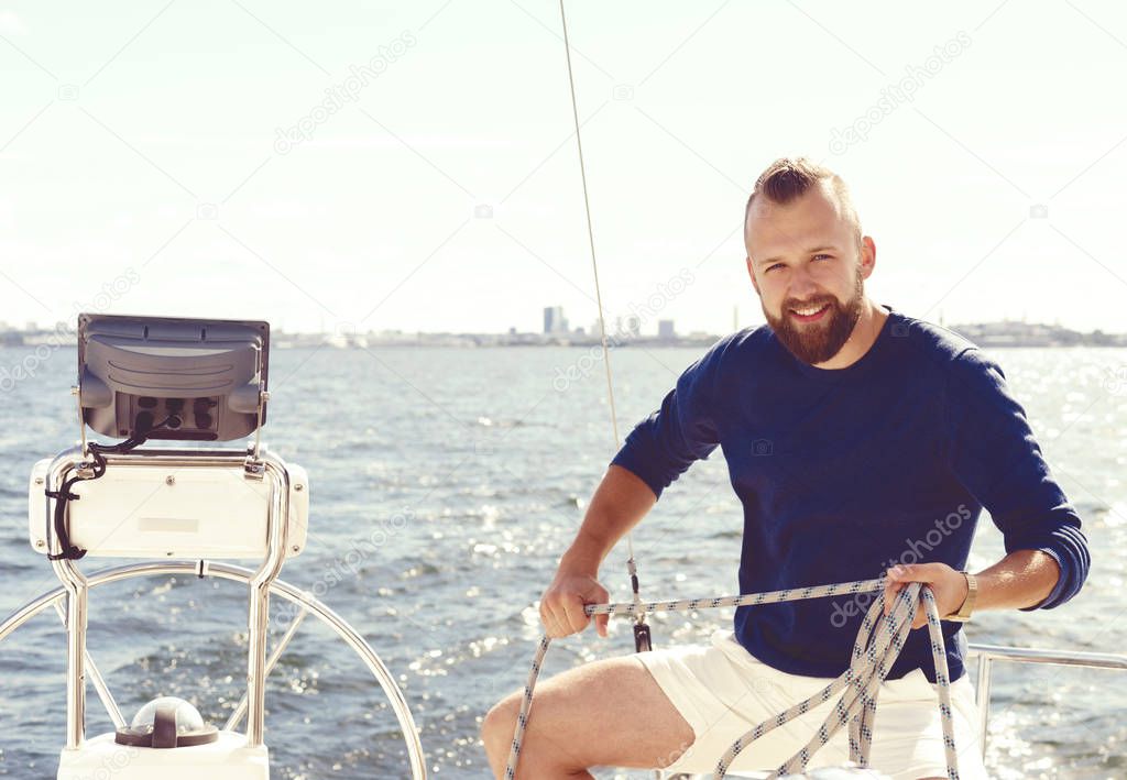 handsome man on yacht