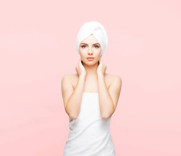 Young woman wrapped in towel — Stock Photo, Image