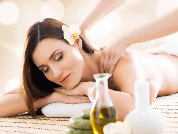 Young and natural woman on spa massage — Stock Photo, Image