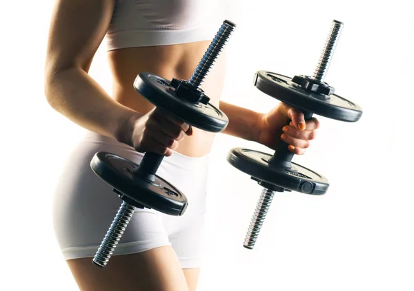 Young woman with dumbbells — Stock Photo, Image