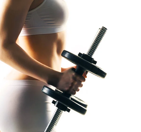 Young woman with dumbbell — Stock Photo, Image