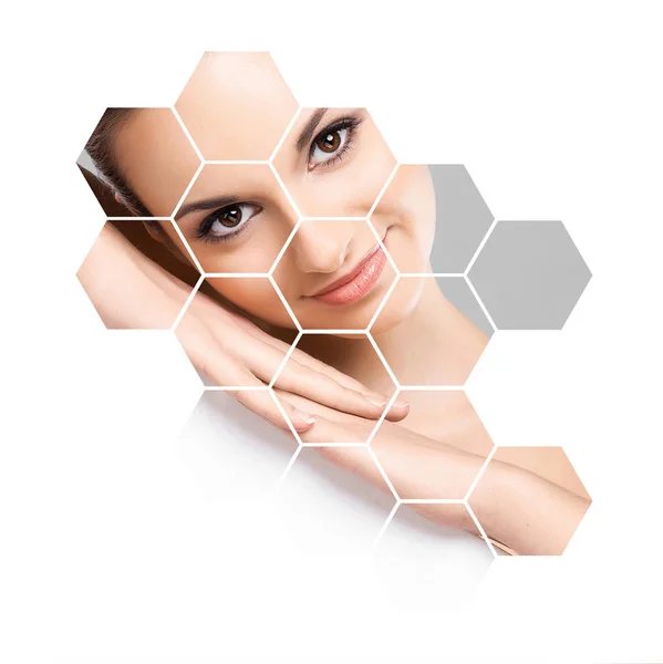 Face of young woman in honeycombs — Stock Photo, Image