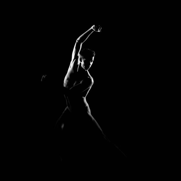 Black and white silhouette trace of male ballet dancer.