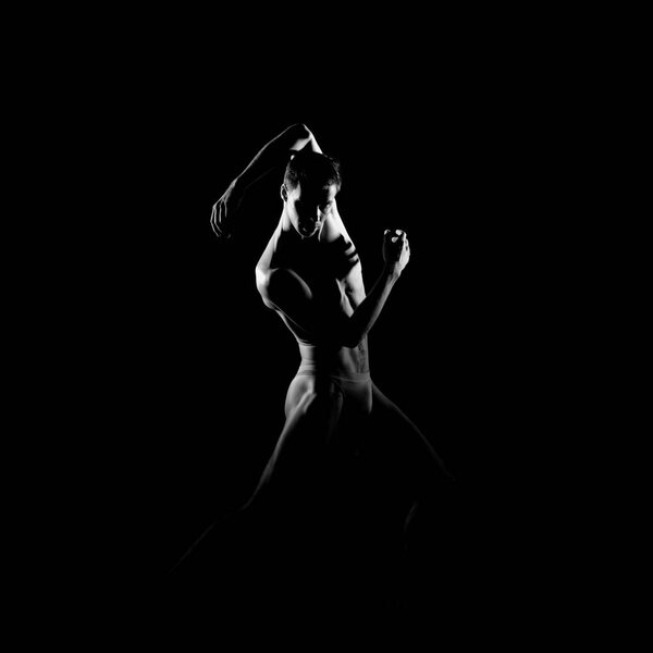 Black and white silhouette trace of male ballet dancer.