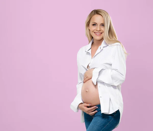 Young Pregnant Woman Studio Embracing Her Beautiful Tummy Stomach Pink — Stock Photo, Image