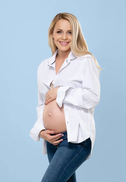 Young Pregnant Woman Studio Embracing Her Beautiful Tummy Stomach Cyan — Stock Photo, Image