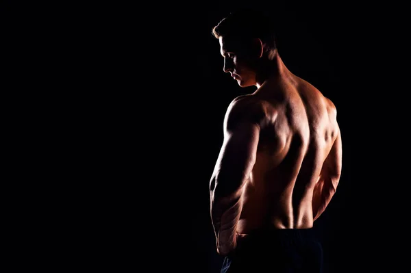 Hombre Fuerte Forma Deportivo Culturista Sobre Fondo Negro Concepto Deporte —  Fotos de Stock