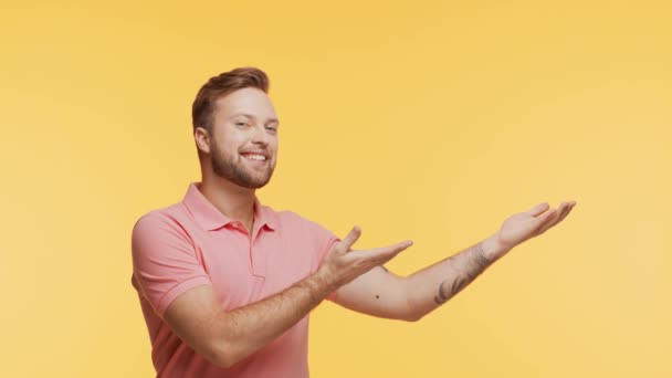 Expressive Young Man Vibrant Background Studio Portrait Handsome Person Pointing — 비디오