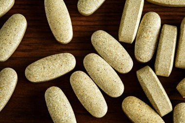 Organic dietary treatment, vitamin capsules clipart