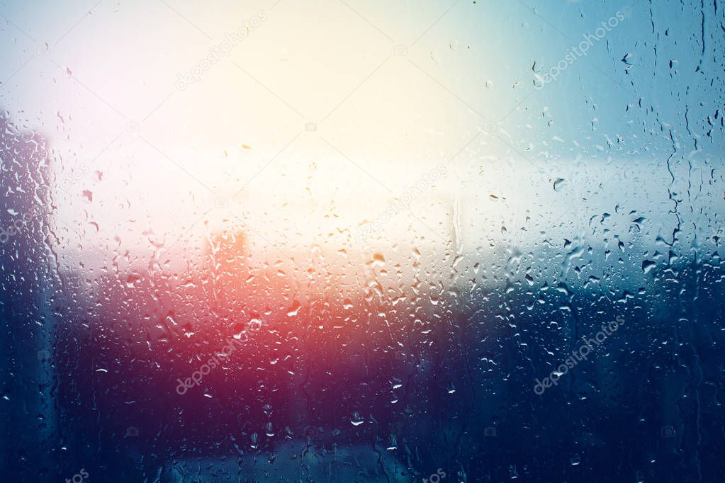 Raindrops on window glass surface