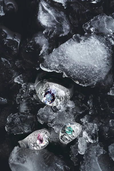 Transparent icy rings made from glass in ice and water — Stock Photo, Image