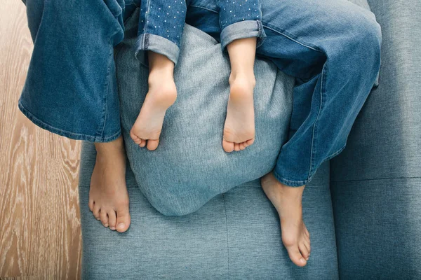 Adult woman feet and child heels top view — ストック写真