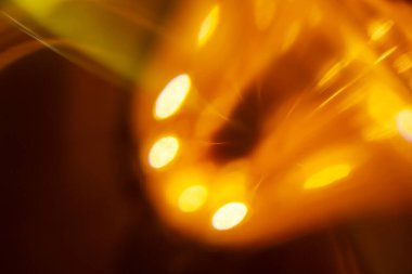 Odaklanamayan ışıklar ve bokeh biçimleriyle soyut arkaplan