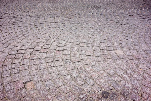 Old European square cobblestones in arcs. — Stock Photo, Image