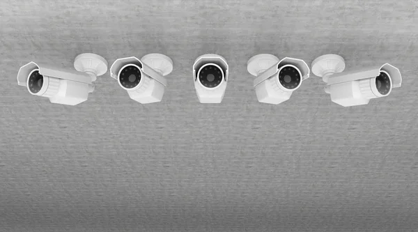Linha de câmeras de vigilância olhar ao redor — Fotografia de Stock