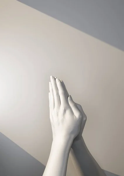 Two white hands in a gesture of prayer — Stock Photo, Image