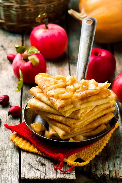 Pumpkin crepes with cinnamon apples — Stock Photo, Image