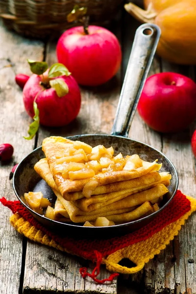 Pumpkin crepes with cinnamon apples — Stock Photo, Image