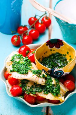 Tembel Fish.Tilpia filetosu domates ile