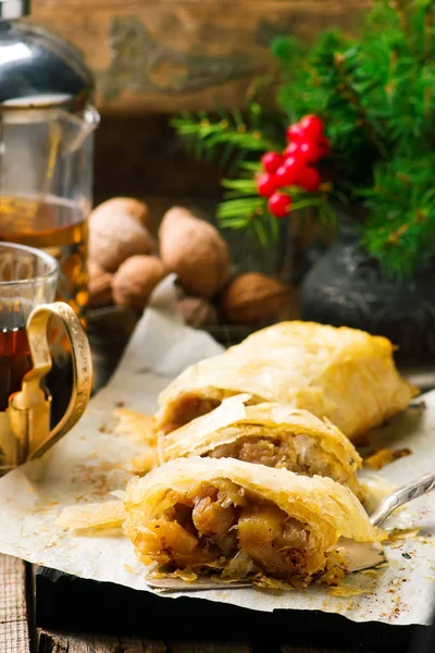 Apples and pineapples  strudel .selective focus. — Stock Photo, Image