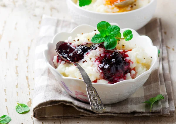Rice pudding with berries jam.selective focus — Stock Photo, Image