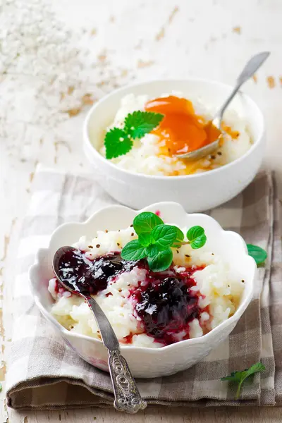 Rice pudding with berries jam.selective focus — Stock Photo, Image