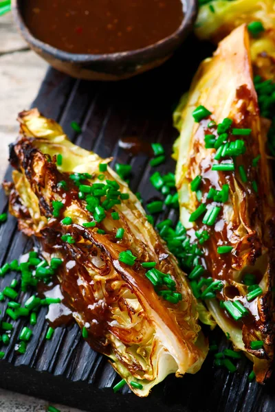 Grilled cabbage wedges ginger miso dressing — Stock Photo, Image