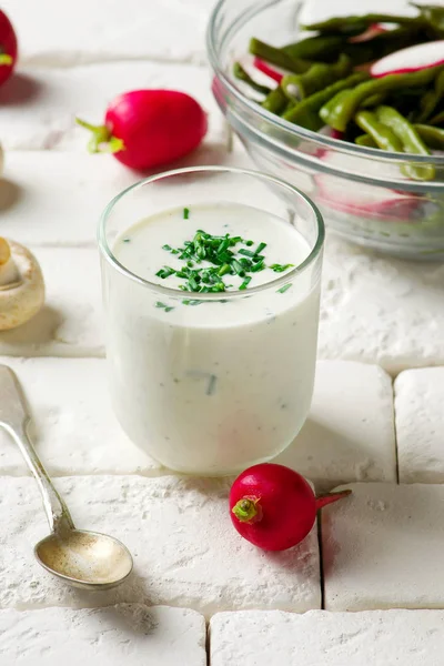 Feta salad dressing in glass jar — Stock Photo, Image