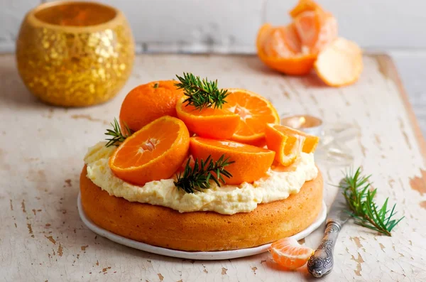 fresh tangerine cake with cream cheese frosting.