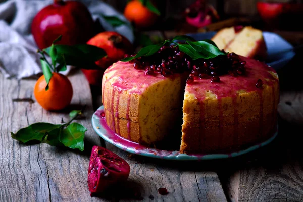 Tangerine bundt cake with pomegranate glaze..selective focus — Stock Photo, Image