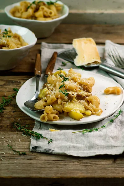 Pasta and Potatoes with Cabbage. Pizzoccheri . — стоковое фото