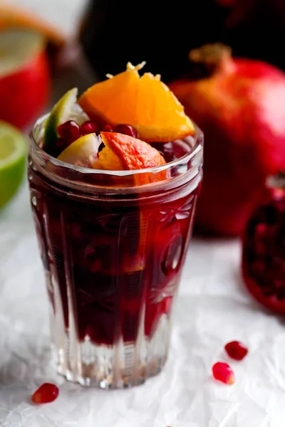 RED WINE CITRUS POMEGRANATE SANGRIA in glasses. — Stock Photo, Image