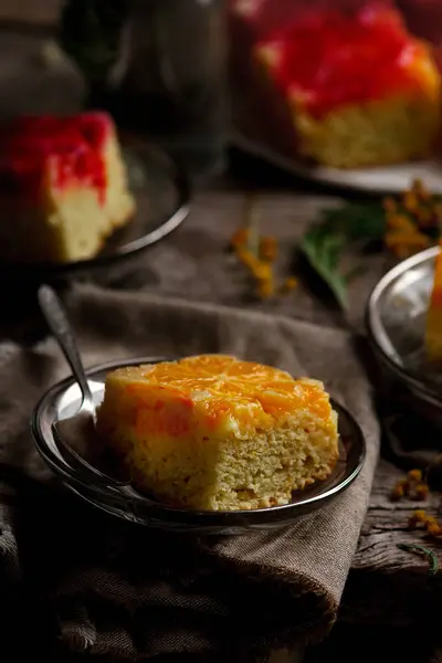 UPSIDE DOWN OMBRE ORANGE CAKE WITH VANILLA.. selective focus — стоковое фото