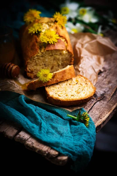 Dandelion petal and honey  bread..selective focus — Stock Photo, Image