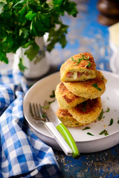Potato patties with mortadella and mozzarella.style rustic — Stock Photo, Image