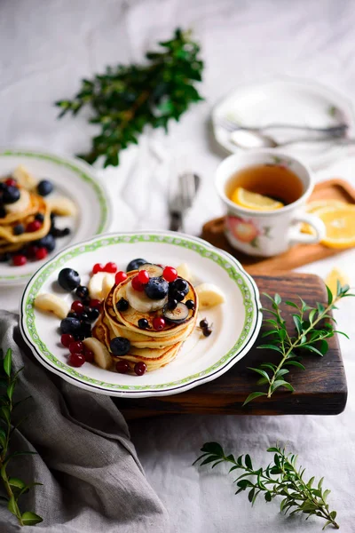 Gluten free pancakes with mixed berry.style vintage