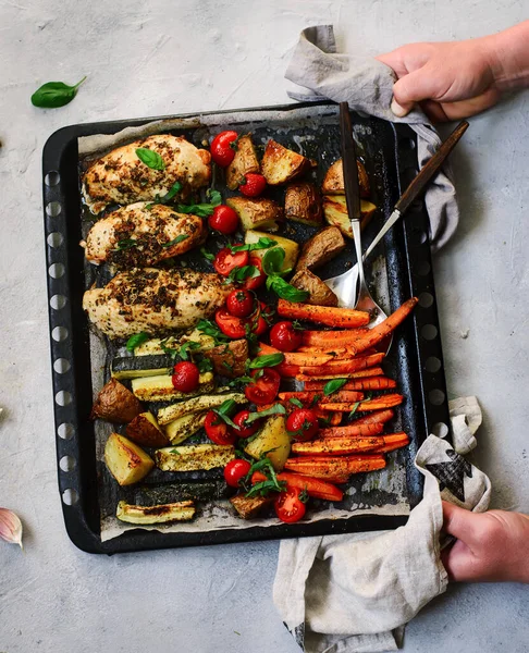 Sheet pan chicken and veggies..style rustic.selective focus