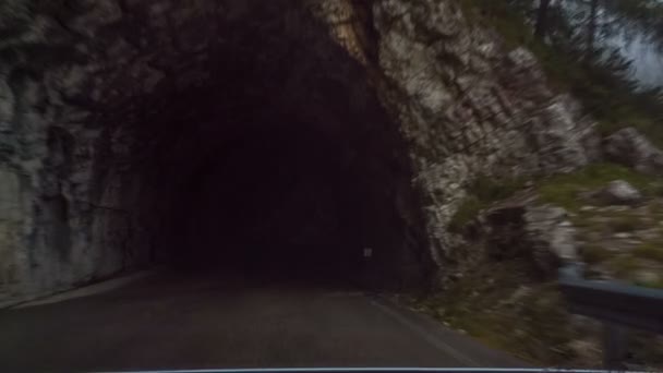 Travel through tunnels along the mountain roads — Stock Video