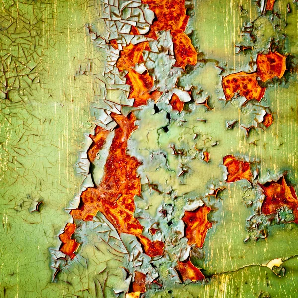 Peeling paint on rusty metal background — Stock Photo, Image