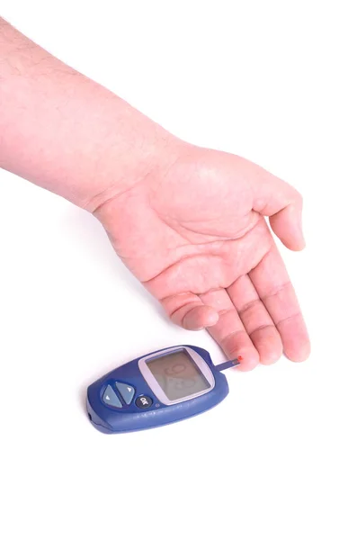 Blood test. Man hands checking blood sugar level by Glucose mete — Stock Photo, Image