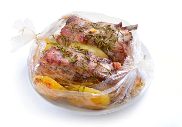 Pişmiş et pişirme için bir kol paketlenmiş. Domuz yağı ile gree